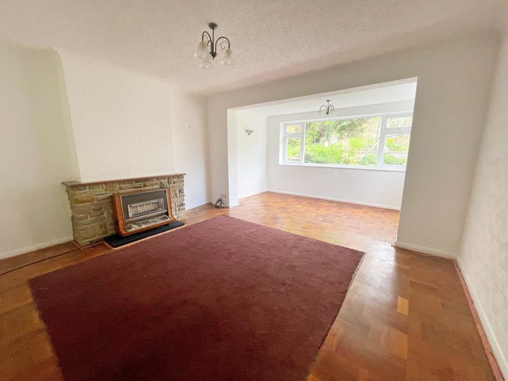 Lot: 30 - DETACHED BUNGALOW FOR IMPROVEMENT AND REPAIR - Living room with extension and fireplace